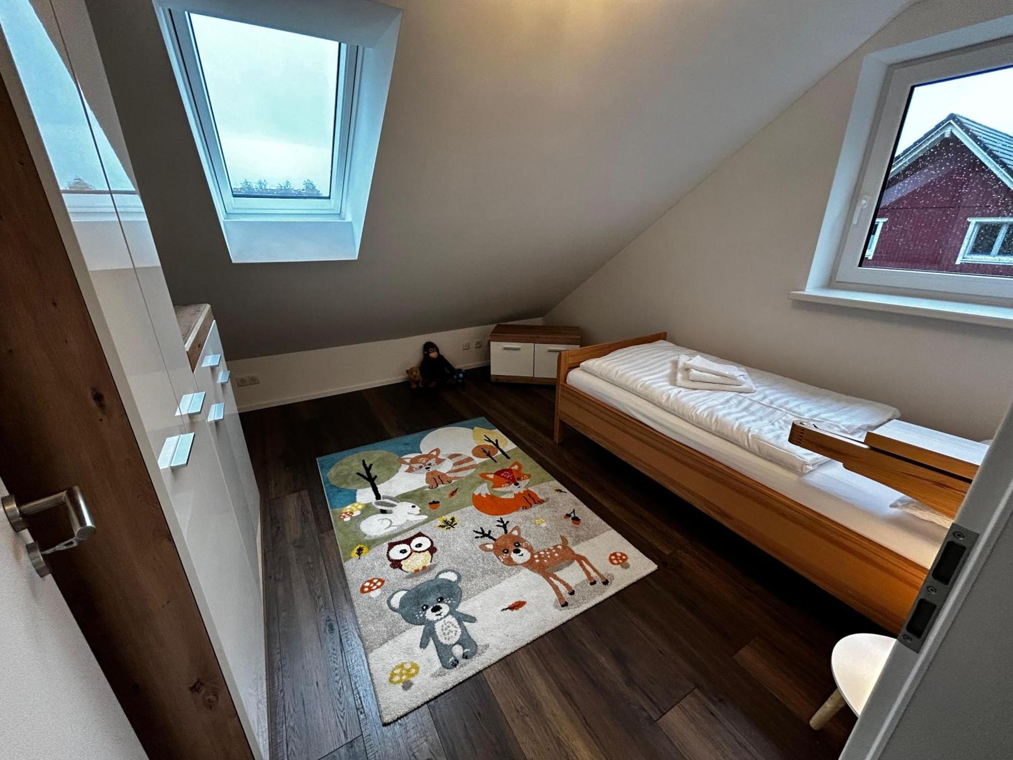 Moderne Ferienwohnung Fuer Familien Im Dachgeschoss Bosau Dış mekan fotoğraf