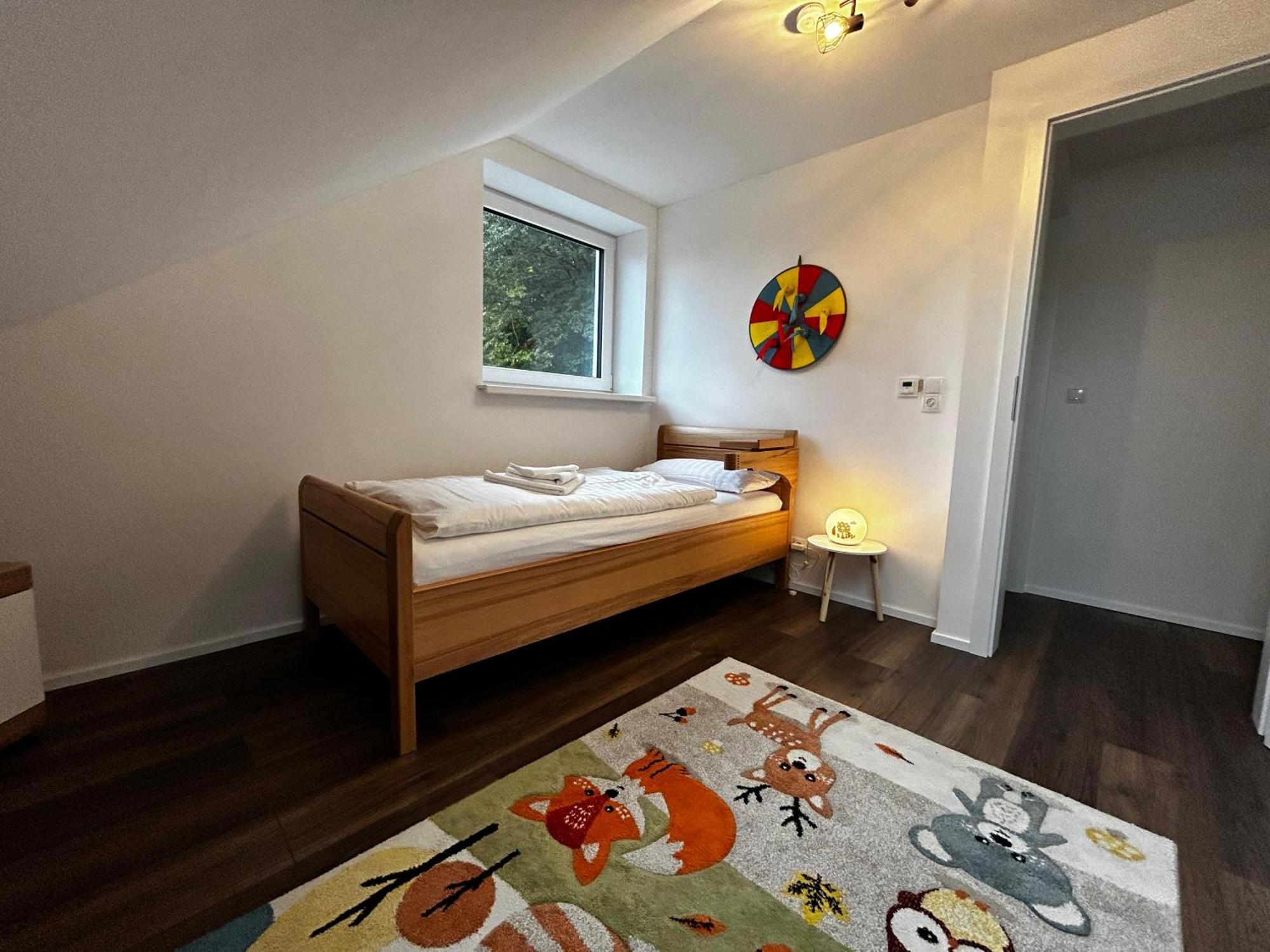 Moderne Ferienwohnung Fuer Familien Im Dachgeschoss Bosau Dış mekan fotoğraf